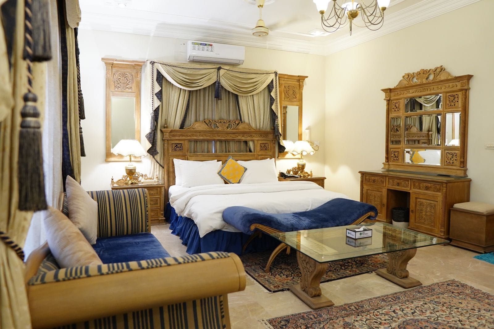 Family guest house room in Karachi with AC and sitting area